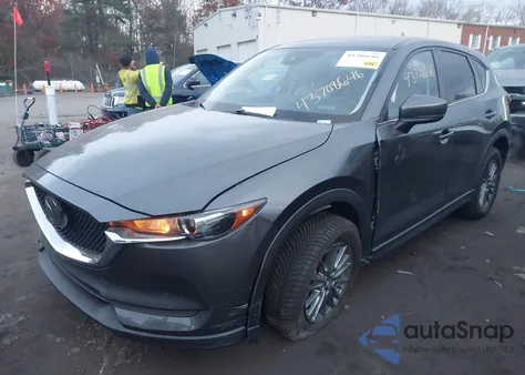 2021 Mazda Cx-5 Touring z USA, uszkodzony, nr VIN JM3KFBCM7M0481668